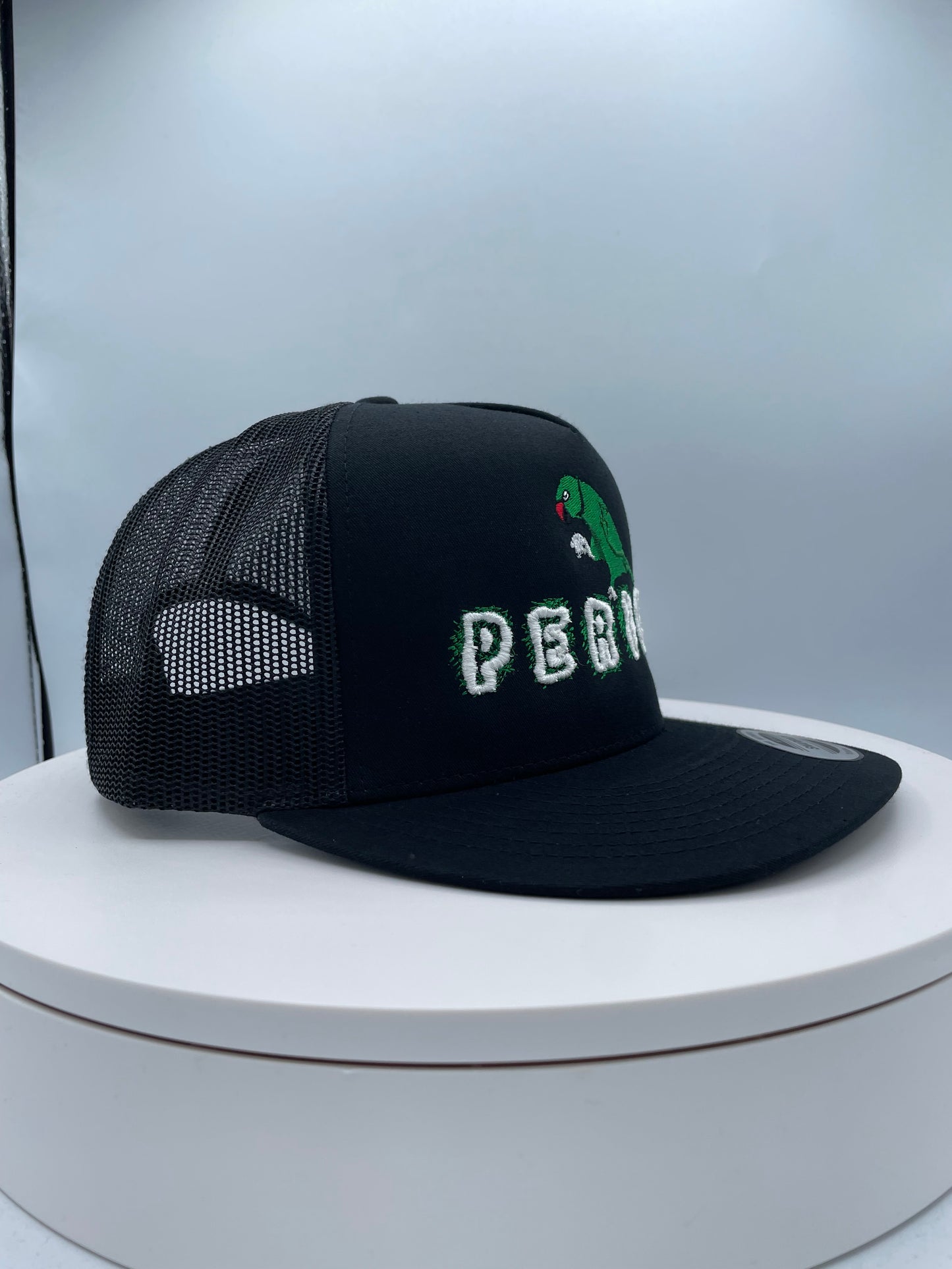 Perico Puff Embroidery Trucker hat.