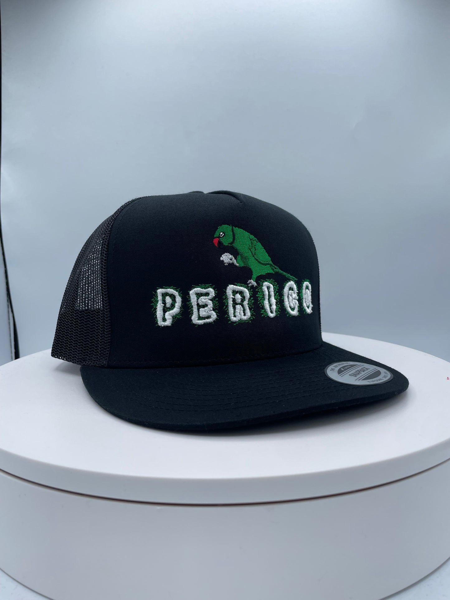 Perico Puff Embroidery Trucker hat.