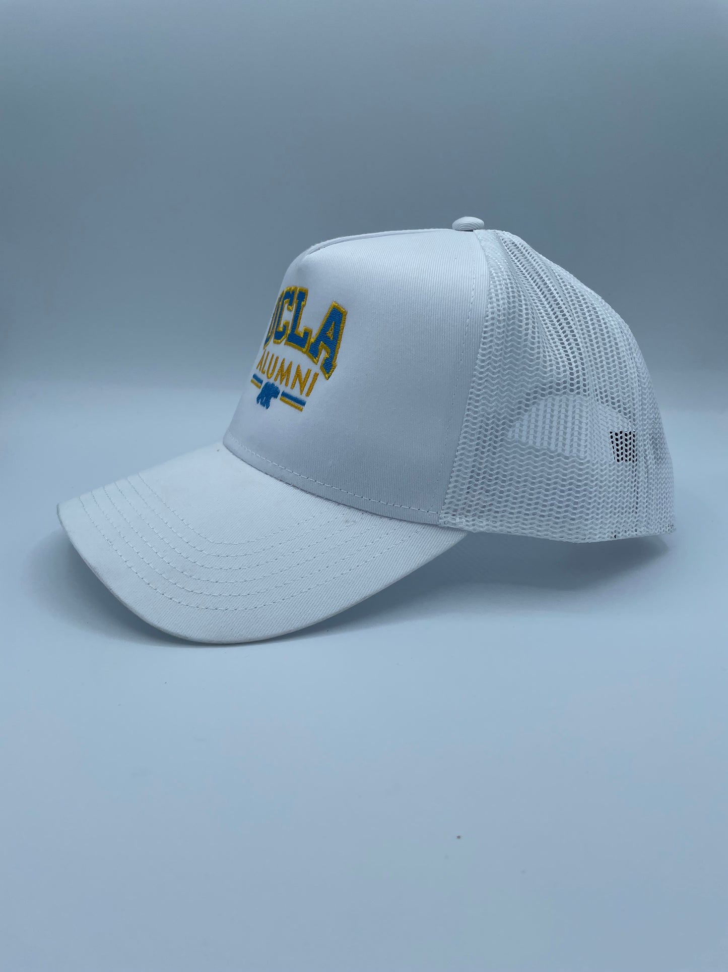 UCLA Alumni Embroidered Trucker Hat.